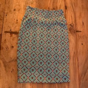 Lularoe pencil skirt in turquoise + red diamond pattern